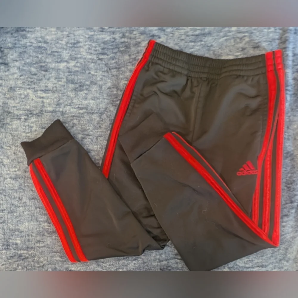 Red Apparel with Black Accents - Picture 3 of 5